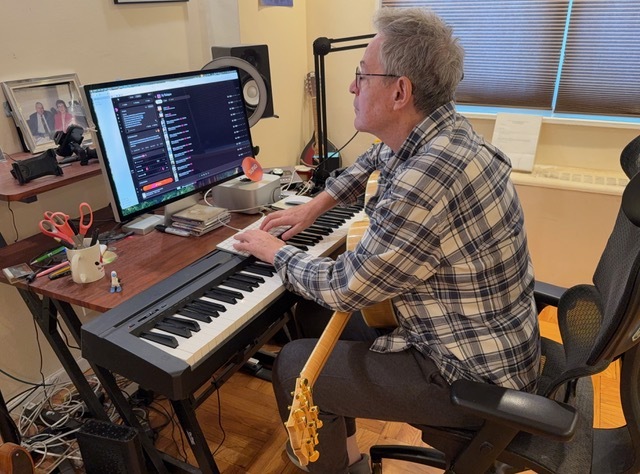 Songs of Love Foundation founder and president John Beltzer uses tools from the AI music platform Suno to create a personalized track for an older adult with dementia.